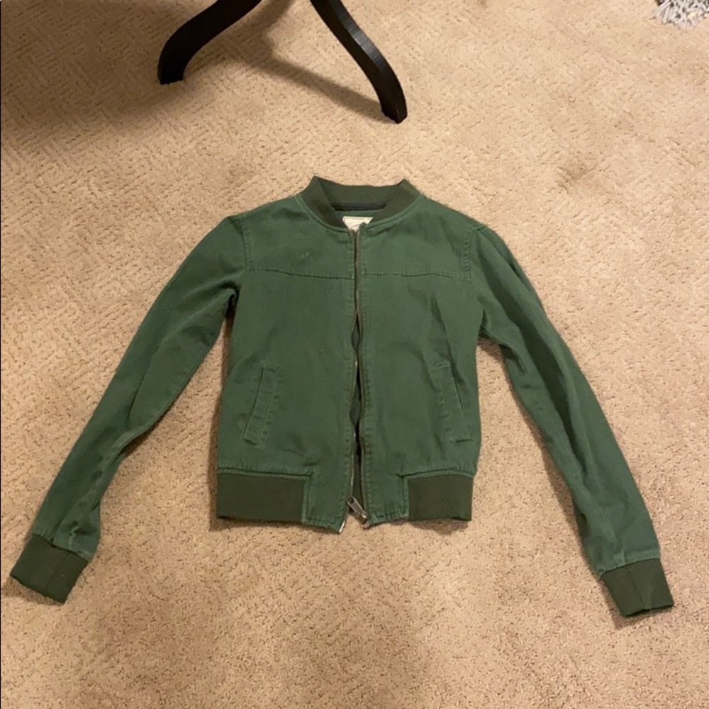 Olive green jacket.